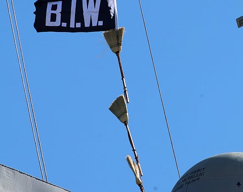 The three brooms signal a successful builder’s trials for the future Thomas Hudner (DDG 116). 198be7d00a8625ce267f957595d2ab69