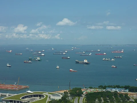 Ships queuing for Singapore Port Image: Flickr.com/kfcatles