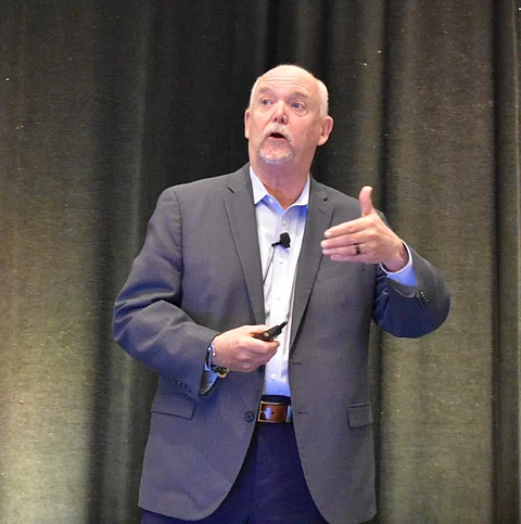 Chris Carlson presents May 1 during the Bank Holding Company Association's spring seminar in Edina, Minn. Carlson is the managing director at Core Academy where he is active in consulting and training.