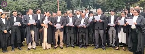 Lawyers gather on Supreme Court lawns to read the Preamble to the Constitution