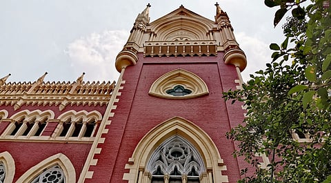 Teacher restraining student from copying by touching her shoulder from behind not molestation: Calcutta High Court