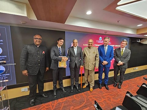 (L to R) Professor Raj Kumar with Singhvi – Trinity Scholarship Awardee Jai Chander Brunner, Justice P.S. Narasimha, Abhishek M. Singhvi, H.E. Mr. Alex Ellis, and Michael Houlgate