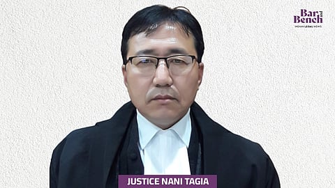 Justice Nani Tagia