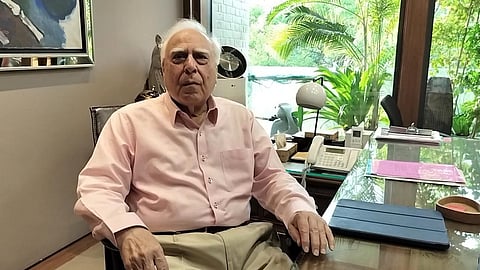 Senior Advocate Kapil Sibal at his Hailey road residence