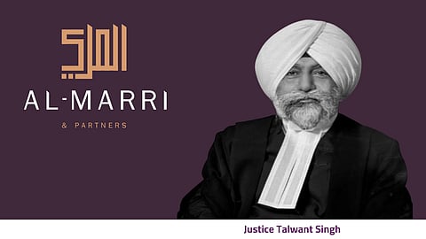 Justice Talwant Singh, with logo of Khaled Al-Marri & Partners