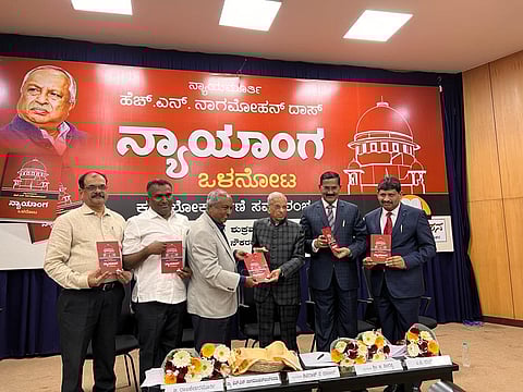 Karnataka High Court judge justice B Veerppa released the book ‘Nyayanga Olanota’ on Friday.