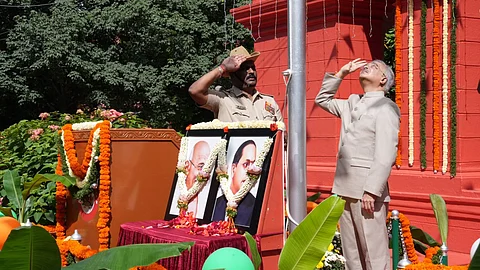 Chief Justice N V Anjaria salutes to National Flag