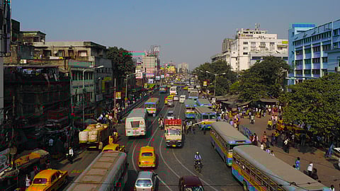 Kolkata, traffic, yellow taxis, buses