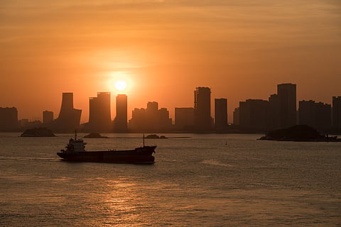 Photo of vessel near Xiamen at sunset