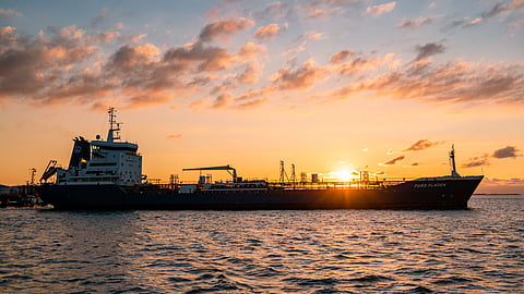 Photo of vessel in waters off Rotterdam at sunset