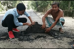 টংলা-মাহালিপাড়া সড়কে নিম্নমানের কাজের অভিযোগ