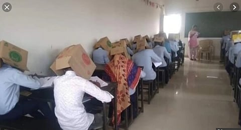 কর্নাটকের কলেজে পরীক্ষায় টোকাটুকি রুখতে ছাত্ৰদের মুখে কার্ডবোর্ড বক্স