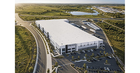 An aerial view showcasing the new 4GWh sodium-ion battery plant for Peak Energy in Sacramento, highlighting the facility's size and surrounding infrastructure.