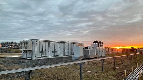 Technicians monitor battery energy storage system data using PowerUp Battery Insight analytics software for Qair's 391 MWh Stor'Sun battery storage portfolio in Mauritius.