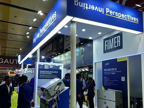 FIMER India stand at REI Expo 2026 with a blue Inverting Perspectives canopy and inverter.