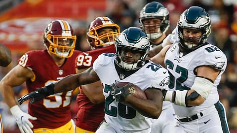 Philadelphia Eagles running back Wendell Smallwood (28) carries the ball during the first half of the NFL football game against the Washington Redskins, Sunday, Dec. 30, 2018 in Landover, Md. (AP Photo/Alex Brandon)