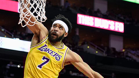 Los Angeles Lakers center JaVale McGee dunks against the Houston Rockets during the first half of an NBA basketball game Saturday, Jan. 19, 2019, in Houston. (AP Photo/Eric Christian Smith)