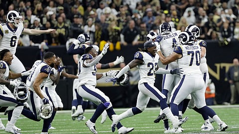 Los Angeles Rams players celebrate after overtime of the NFL football NFC championship game against the New Orleans Saints, Sunday, Jan. 20, 2019, in New Orleans. (AP Photo/David J. Phillip)