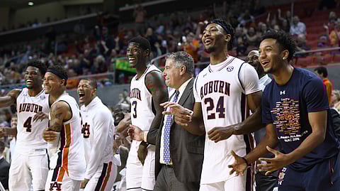 Auburn head coach Bruce Pearl and his players react to the final seconds of their win over North Florida during an NCAA college basketball game Saturday, Dec. 29, 2018, in Auburn, Ala. (AP Photo/Julie Bennett)