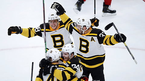 The Boston Bruins celebrate a goal.