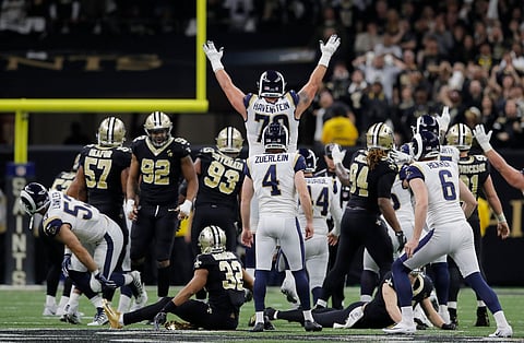 Los Angeles Rams kicker Greg Zuerlein reacts after his game-winning field goal in overtime of the NFL football NFC championship game against the New Orleans Saints, Sunday, Jan. 20, 2019, in New Orleans. The Rams won 26-23. (AP Photo/Carolyn Kaster)