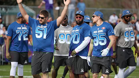 NFC Atlanta Falcons center Alex Mack (51) gestures during NFL football Pro Bowl practice in Orlando, Fla., Wednesday, Jan. 23, 2019. (Stephen M. Dowell/Orlando Sentinel via AP)/Orlando Sentinel via AP)