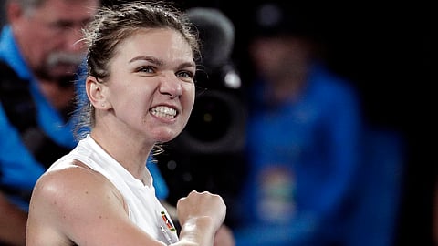 Romania’s Simona Halep celebrates after defeating United States’ Sofia Kenin in their second round match at the Australian Open tennis championships in Melbourne, Australia, Thursday, Jan. 17, 2019. (AP Photo/Aaron Favila)