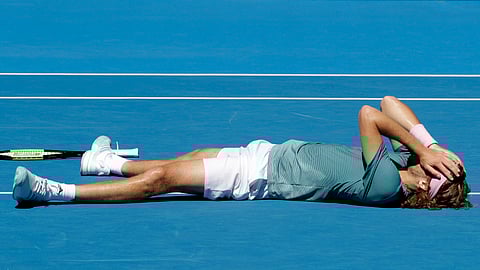 Greece’s Stefanos Tsitsipas celebrates after defeating Spain’s Roberto Bautista Agut in their quarterfinal match at the Australian Open tennis championships in Melbourne, Australia, Tuesday, Jan. 22, 2019. (AP Photo/Mark Schiefelbein)