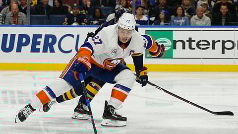 New York Islanders forward Anders Lee (27) carries the puck during the second period of an NHL hockey game against the Buffalo Sabres, Monday, Dec. 31, 2018, in Buffalo N.Y. (AP Photo/Jeffrey T. Barnes)