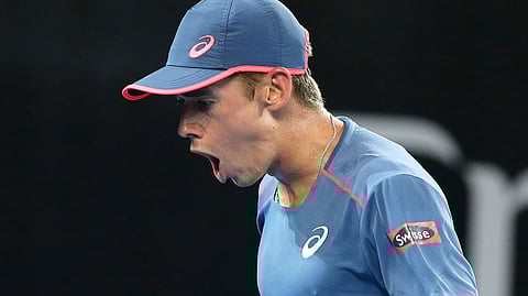 Alex De Minaur of Australia reacts after winning a point during his quarter-final match against Jo-Wilfried Tsonga of France at the Brisbane International tennis tournament in Brisbane, Australia, Friday, Jan. 4, 2019. (AP Photo/Tertius Pickard)