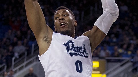 Nevada forward Tre’Shawn Thurman dunks against Utah State during the first half of an NCAA college basketball game in Reno, Nev., Wednesday, Jan. 2, 2019. (AP Photo/Tom R. Smedes) 