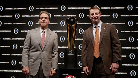 1Alabama head coach Nick Saban and Clemson head coach Dabo Swinney pose with the trophy at a news conference for the NCAA college football playoff championship game Sunday, Jan. 6, 2019, in Santa Clara, Calif. (AP Photo/David J. Phillip)