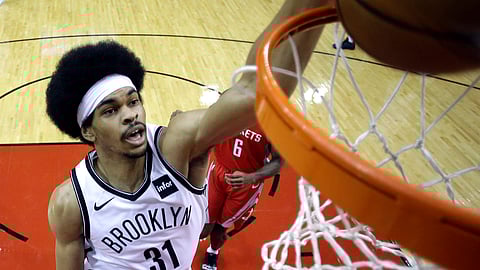 Brooklyn Nets’ Jarrett Allen (31) dunks the ball against the Houston Rockets during the first half of an NBA basketball game Wednesday, Jan. 16, 2019, in Houston. (AP Photo/David J. Phillip)