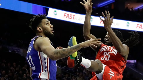 Houston Rockets’ Kenneth Faried, right, goes up for a shot against Philadelphia 76ers’ Jonah Bolden during the first half of an NBA basketball game, Monday, Jan. 21, 2019, in Philadelphia. (AP Photo/Matt Slocum)