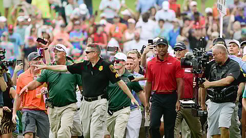 File- This Sept. 23, 2018, file photo shows Tiger Woods making his way down the 18th fairway during the final round of the Tour Championship golf tournament in Atlanta. Woods said Tuesday, Jan. 22, 2019, he doesn’t think he can ever feel that kind of energy again. (AP Photo/John Amis, File)