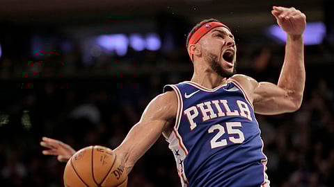 Philadelphia 76ers’ Ben Simmons reacts after dunking during the first half of an NBA basketball game against the New York Knicks, Sunday, Jan. 13, 2019, in New York. (AP Photo/Seth Wenig)