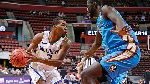 Saint Louis guard Javon Bess (3) looks to pass under pressure from Florida State center Christ Koumadje (21) in the first half of an NCAA college basketball game, part of the Orange Bowl Classic tournament Saturday, Dec. 22, 2018, in Sunrise, Fla. (AP Photo/Joe Skipper)