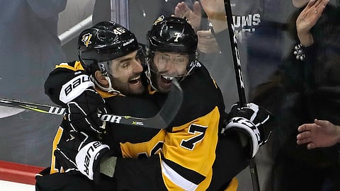 Pittsburgh Penguins’ Matt Cullen (7) celebrates his goal with Zach Aston-Reese (46) during the first period of an NHL hockey game against the Winnipeg Jets in Pittsburgh, Friday, Jan. 4, 2019. (AP Photo/Gene J. Puskar)