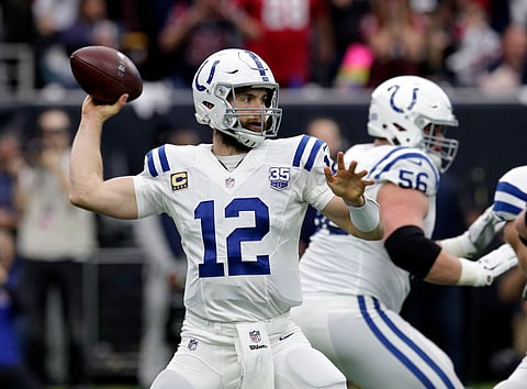 Indianapolis Colts quarterback Andrew Luck (12) throws against the Houston Texans during the first half of an NFL wild card playoff football game, Saturday, Jan. 5, 2019, in Houston. (AP Photo/Michael Wyke)