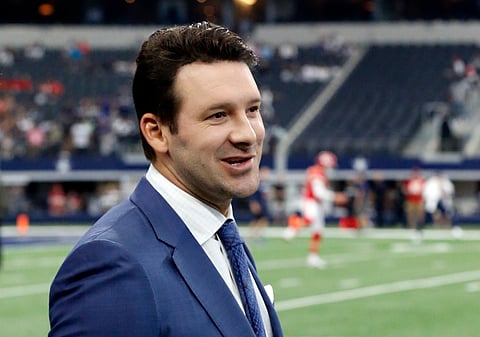 FILE - In this Nov. 5, 2017, file photo, CBS football analyst Tony Romo walks across the field during warm ups before an NFL football game between the Kansas City Chiefs and Dallas Cowboys, in Arlington, Texas. Romo is finally in the Super Bowl. After being unable to lead Dallas to the big game, Romo will call the game for CBS in his second season in the booth. But just like Jared Goff and Tom Brady, Romo is coming in with plenty of momentum after his call of the AFC Championship game _ where he predicted many of New England’s plays and tendencies _ drew universal accolades. (AP Photo/Michael Ainsworth, File)