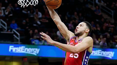 Philadelphia 76ers’ Ben Simmons (25), from Australia, shoots against Cleveland Cavaliers’ Rodney Hood (1) during the second half of an NBA basketball game Sunday, Dec. 16, 2018, in Cleveland. (AP Photo/Ron Schwane)
