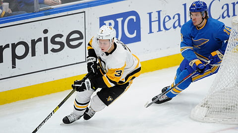 Pittsburgh Penguins’ Olli Maatta (3), of Finland, skates around St. Louis Blues’ Robert Thomas (18) during the period of an NHL hockey game Saturday, Dec. 29, 2018, in St. Louis. (AP Photo/Bill Boyce)