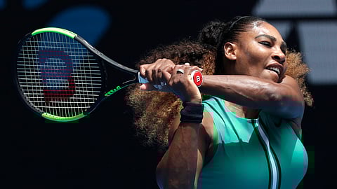 United States’ Serena Williams hits a backhand return to Germany’s Tatjana Maria during their first round match at the Australian Open tennis championships in Melbourne, Australia, Tuesday, Jan. 15, 2019. (AP Photo/Kin Cheung)