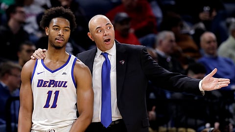 DePaul coach Dave Leitao, right, talks to guard Eli Cain during the second half of the team’s NCAA college basketball game against Butler, Wednesday, Jan. 16, 2019, in Chicago. Butler won 87-69. (AP Photo/Nam Y. Huh)