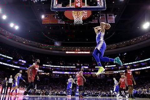 Sixers’ Ben Simmons skys in for a first-half dunk against the Heat Thursday (Matt Slocum)