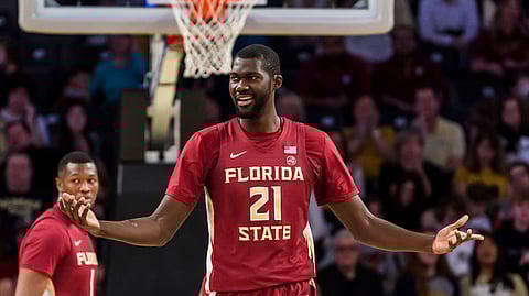 Florida State center Christ Koumadje reacts to a call during the first half of an NCAA college basketball game against Georgia Tech (AP Photo/Danny Karnik)