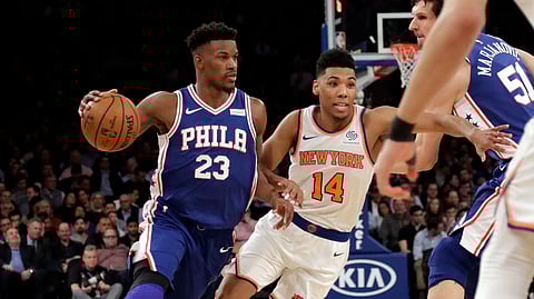 Philadelphia 76ers’ Jimmy Butler (23) drives past New York Knicks’ Allonzo Trier (14), Wednesday, Feb. 13, 2019, in New York. (AP Photo/Frank Franklin II)