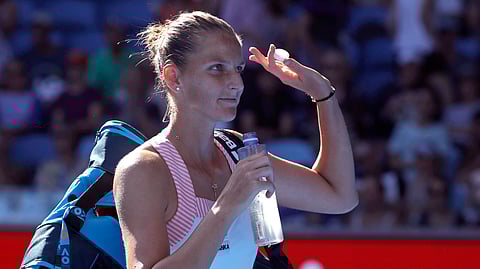 Karolina Pliskova of the Czech Republic waves at the Australian Open tennis championships, Monday, Jan. 21, 2019. (AP Photo/Mark Schiefelbein)