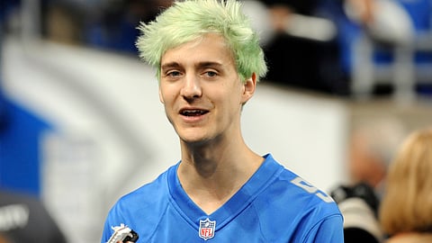 Tyler “Ninja” Blevins before an NFL football game between the Detroit Lions and New York Jets in Detroit. Blevins has the emergence of an 18-year-old “Apex” superstar. (AP Photo/Jose Juarez, File)