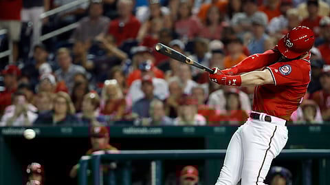 Washington Nationals’ Bryce Harper hits a two-RBI double during the fifth inning of a baseball game against the San Francisco Giants. (AP Photo/Alex Brandon, File)